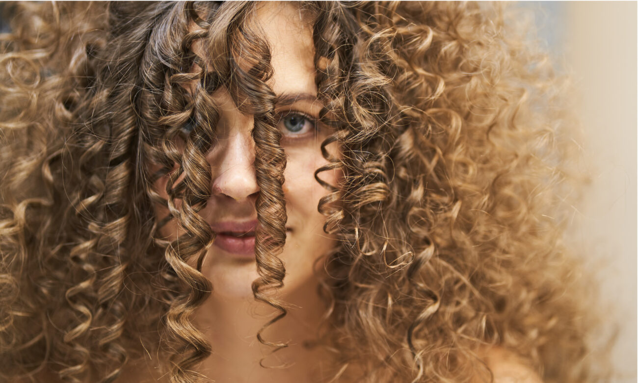 Curly white young girl closeup